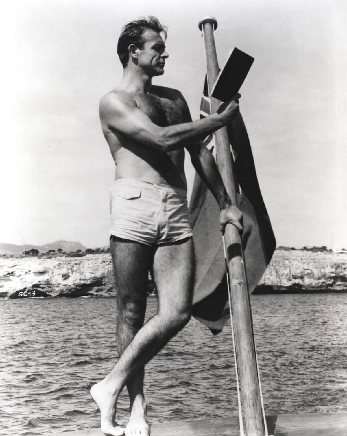 Sean Connery reading by the sea photo print