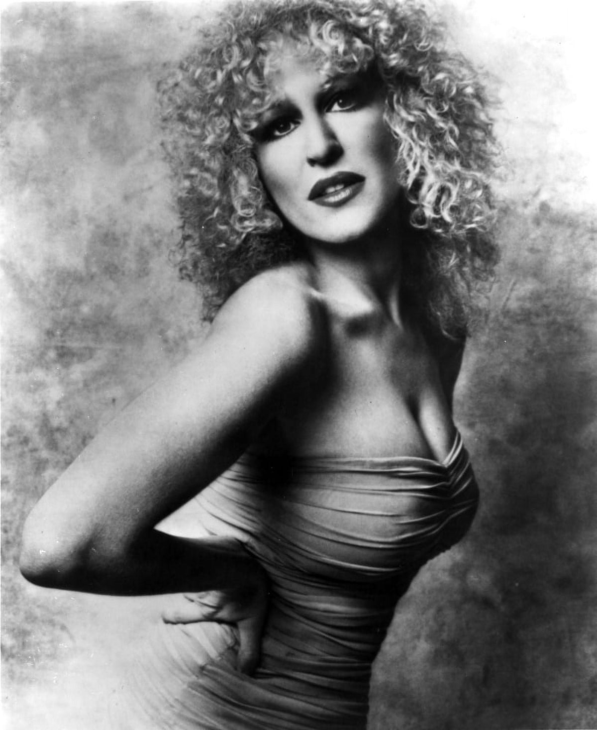 Bette Midler leaning forward portrait photo print in tube dress.