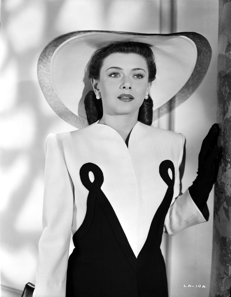 Lenore Aubert vintage photo print in elegant dress and hat.