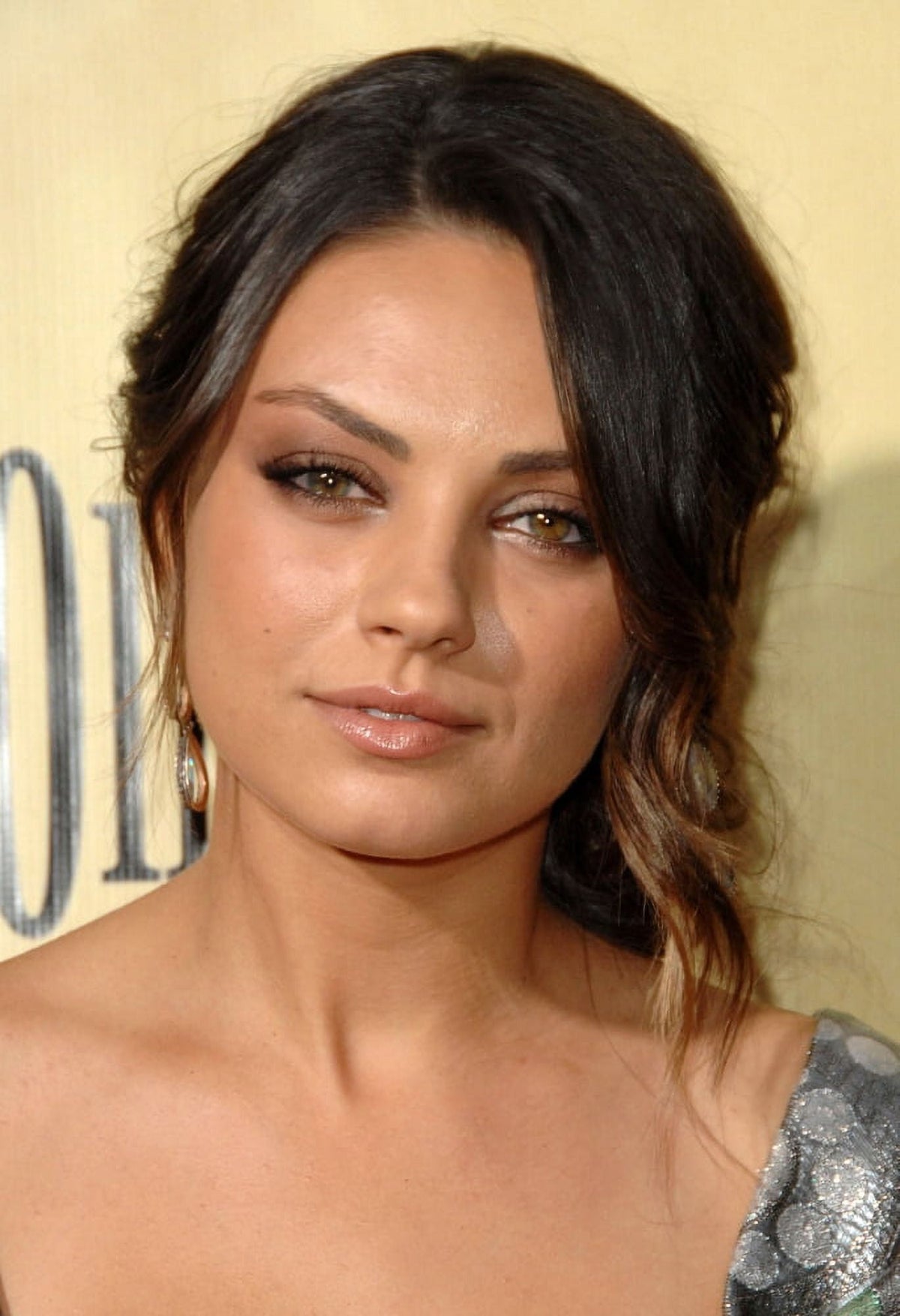 Mila Kunis at the Extract Movie Premiere Photo Print
