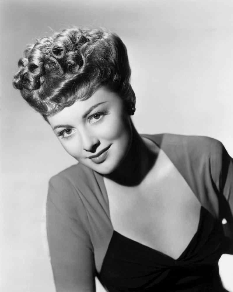 Olivia De Havilland portrait poster print available in multiple sizes.