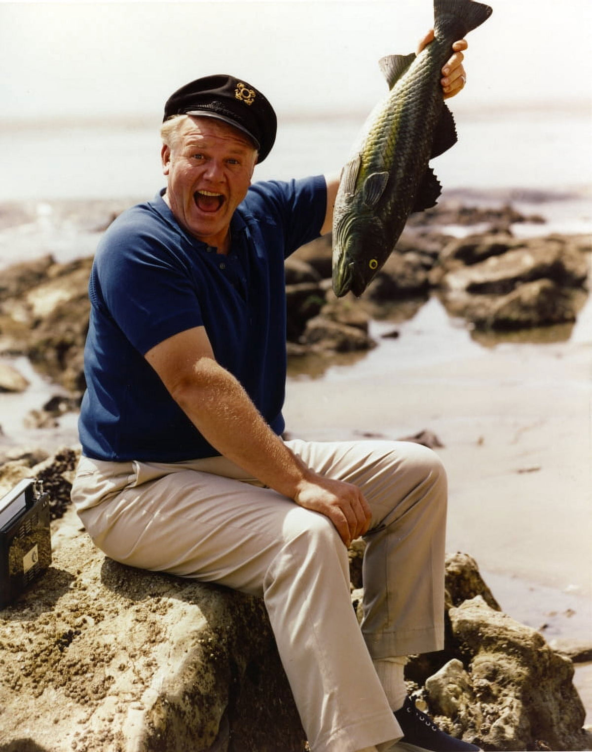 Alan Hale Jr. from Gilligan's Island holding a fish photo print.
