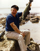 Alan Hale Jr. from Gilligan's Island holding a fish photo print.