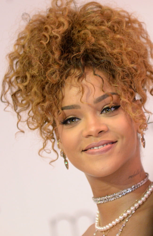 Rihanna photo print from her in-store appearance at Macy's Brooklyn for Riri fragrance launch.
