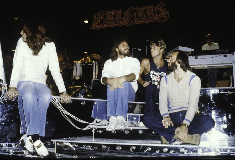 The Bee Gees Photo Print on stage, iconic music performance.