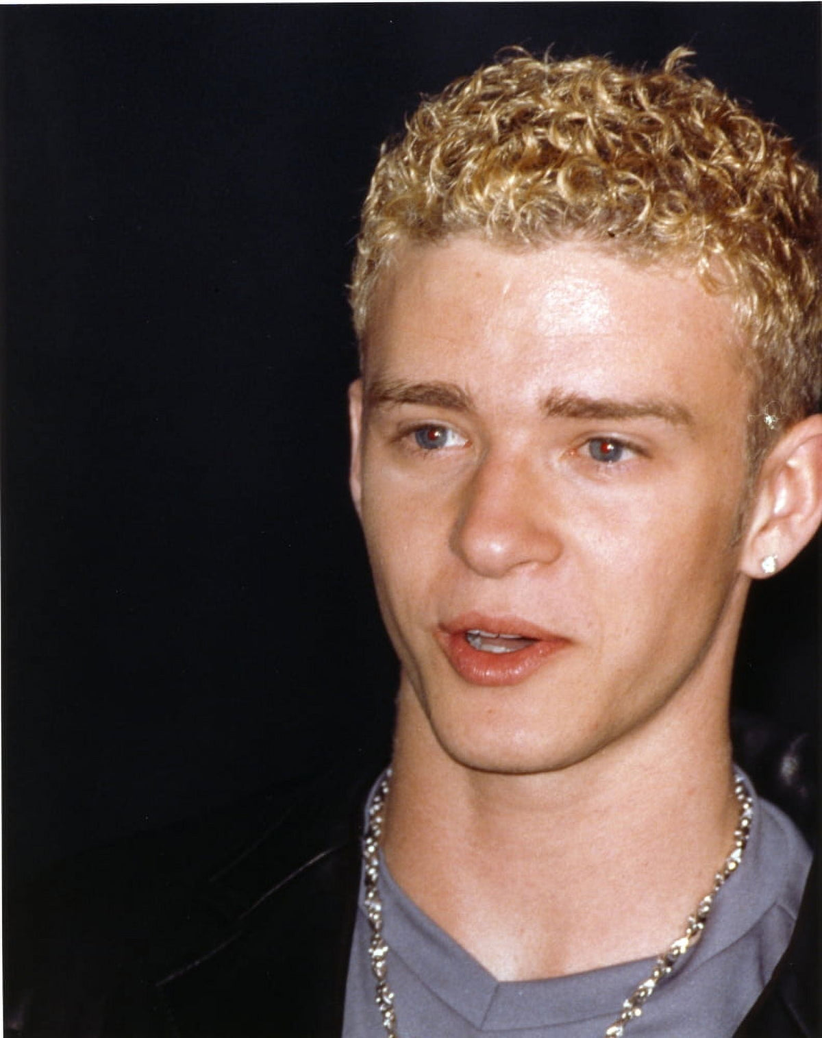 NSYNC singing in checkered outfits photo print.