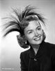 Donna Reed smiling in a classic black and white photo print