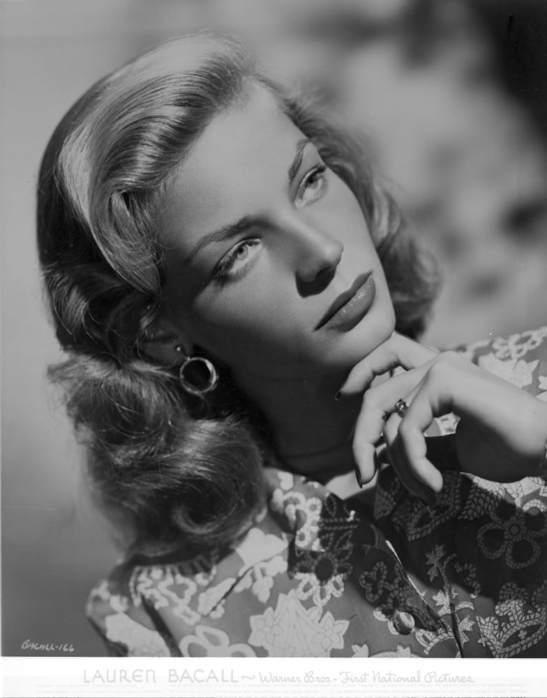 Lauren Bacall classic photo print capturing Hollywood elegance.