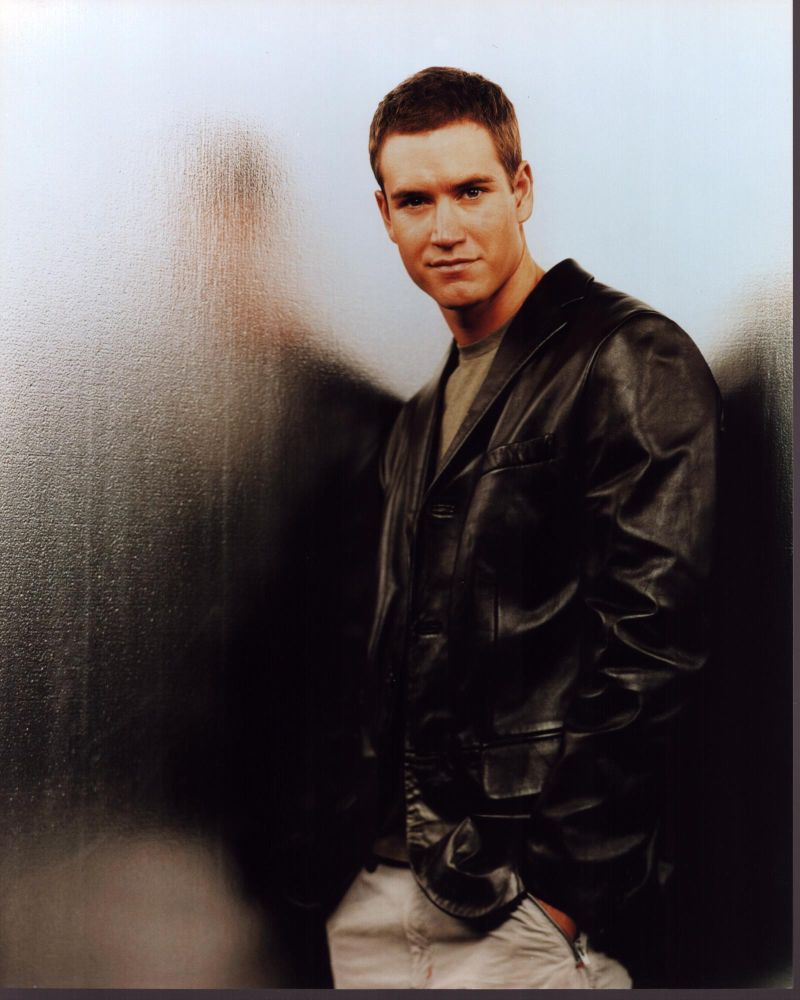 Mark-Paul Gosselaar wearing a leather jacket on a silver wall photo print