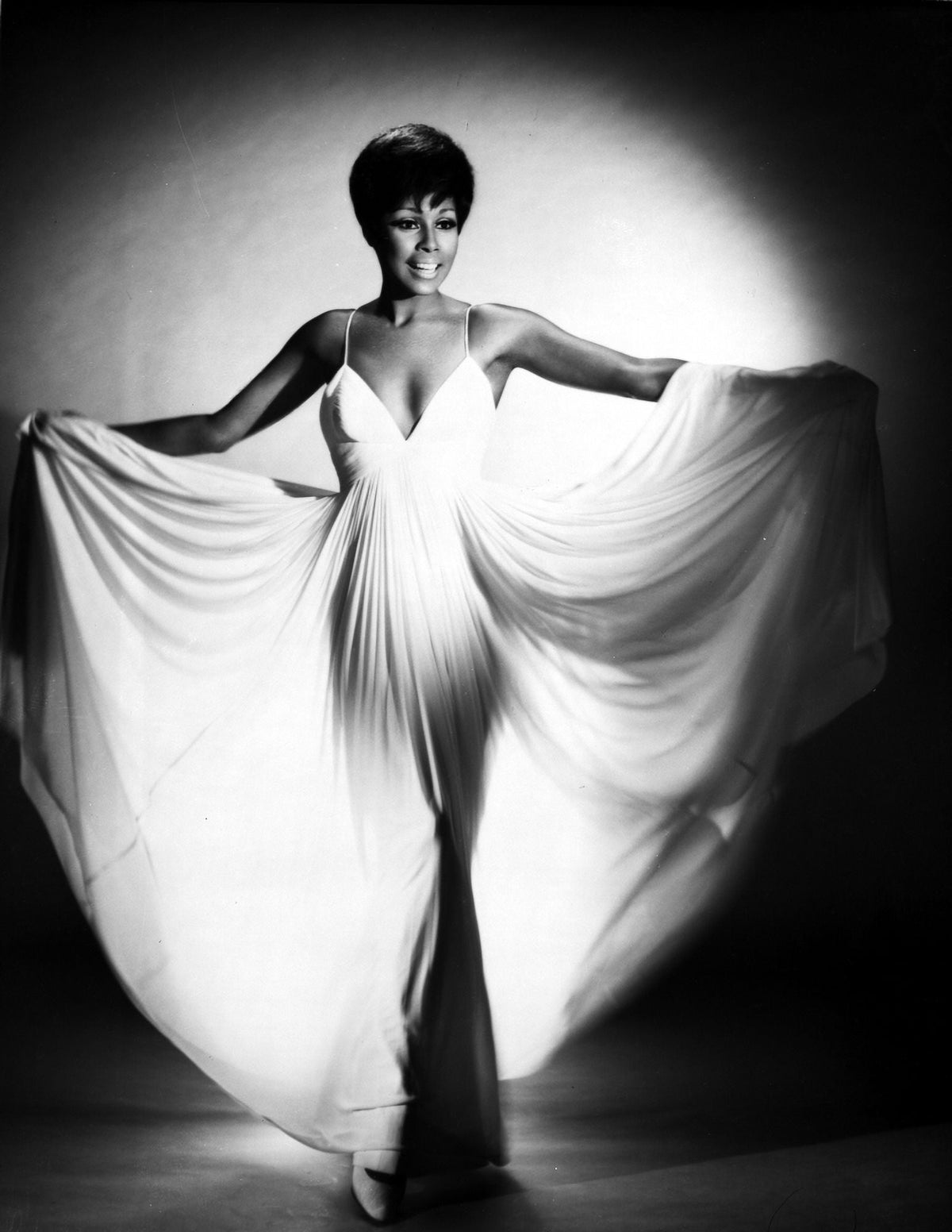 Elegant portrait of Diahann Carroll in a wide white dress photo print.