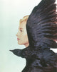 Art print of Tippi Hedren in side view with a crow, perfect for home decor.