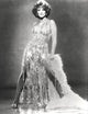 Ann-Margaret wearing a glittered dress photo print.