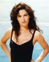 Kim Delaney posed in black sleeveless outfit photo print