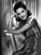 Maureen O'Sullivan vintage photo print in printed dress.