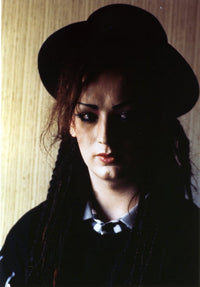 Boy George portrait photo print of a woman in a black dress and hat.