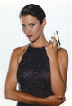Carey Lowell posing with a small gun photo print
