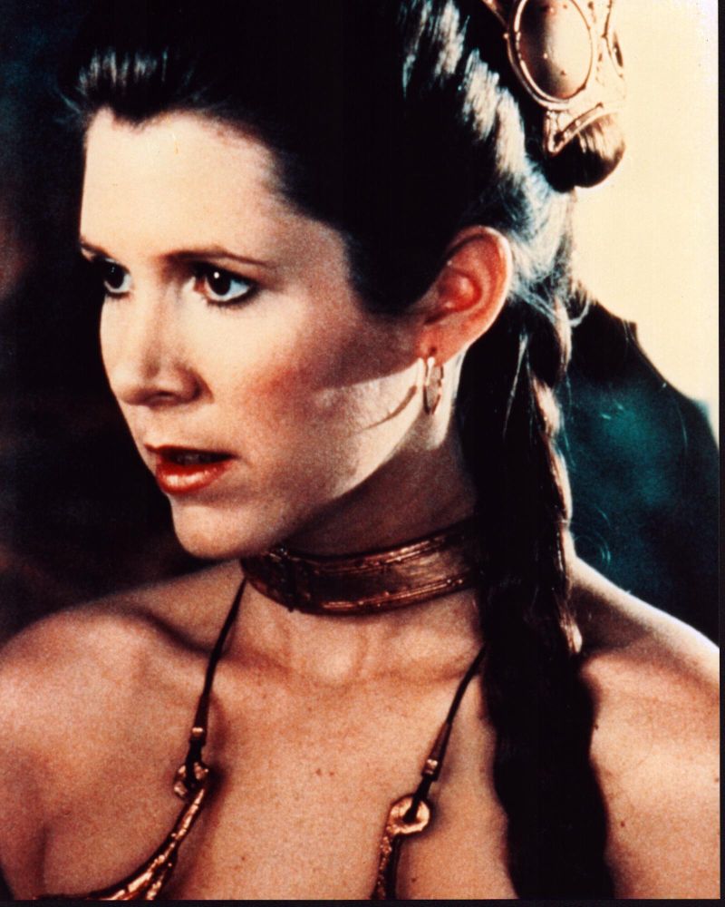 Carrie Fisher in Princess Leia slave costume photo print from Star Wars: Return of the Jedi