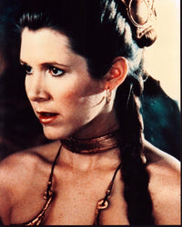 Carrie Fisher in Princess Leia slave costume photo print from Star Wars: Return of the Jedi