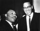 Martin Luther King Jr. and Malcolm X photo print showcasing civil rights leaders.