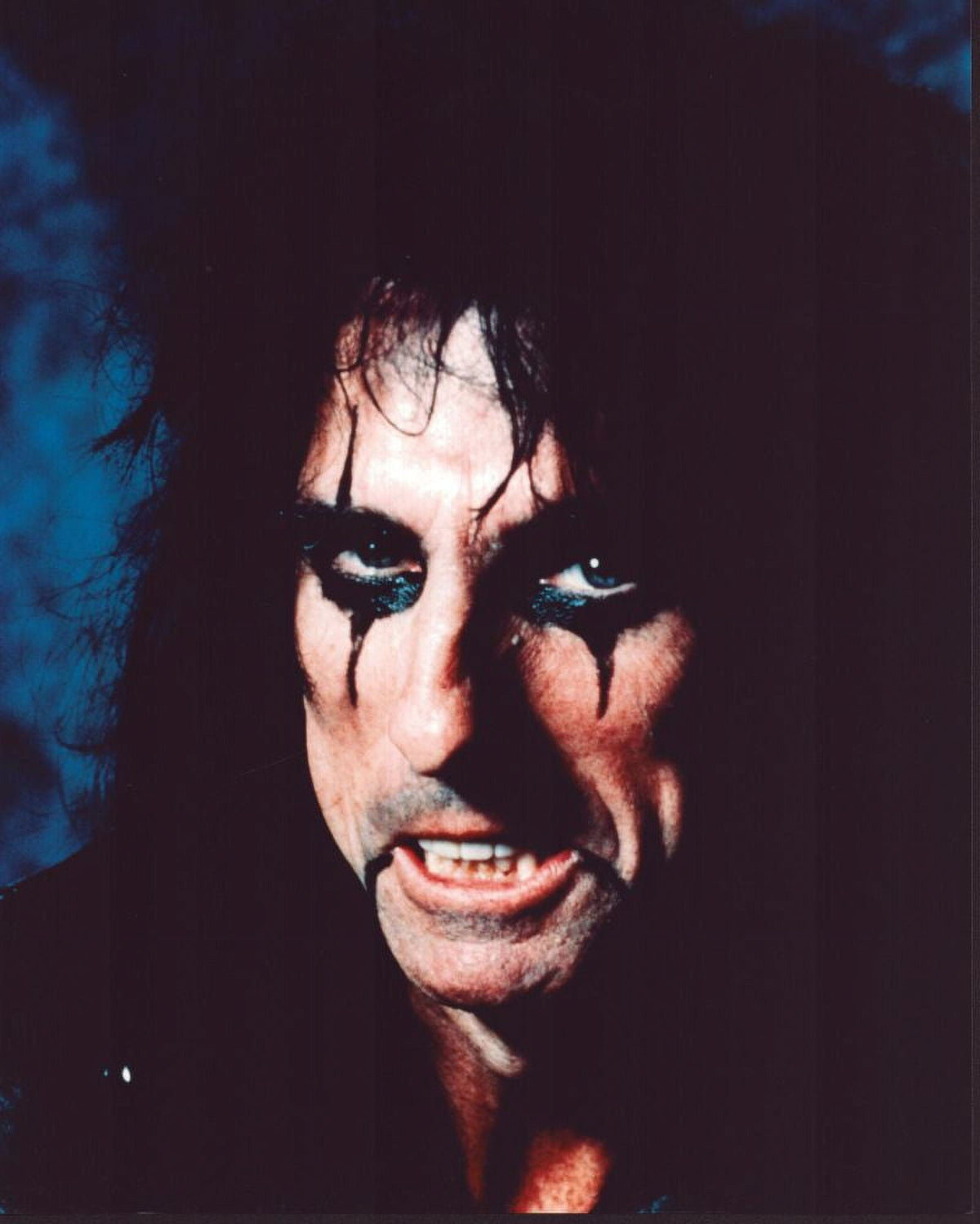 Alice Cooper closeup photo print showcasing theatrical makeup and rock energy.