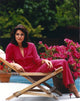 Stockard Channing seated elegantly in a red dress photo print
