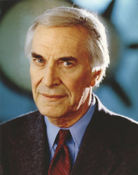 Close-up portrait of Martin Landau wearing a black coat, photo print.
