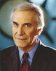 Close-up portrait of Martin Landau wearing a black coat, photo print.