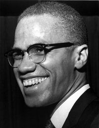 Malcolm X smiling photo print, available in multiple sizes.