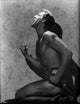 Johnny Weissmuller portrait photo print, kneeling and shouting.