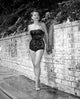 Anne Baxter Brick Wall Photo Print showcasing urban texture.