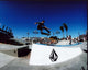 Chris Cole skateboarding on Volcom ramp photo print.