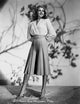Rita Hayworth posed in a white blouse photo print