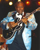 BB King performing live on stage in blue tuxedo with Black Les Paul guitar photo print.