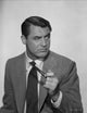 Cary Grant profile portrait photo print in gray suit with pipe