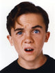 Close-up portrait photo print of Frankie Muniz on a white background.