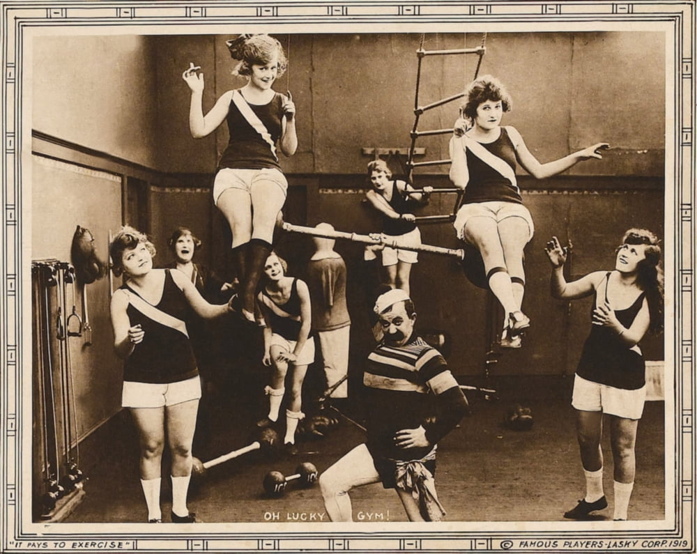 It Pays To Exercise movie lobby card print featuring Chester Conklin from 1918.