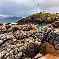 Fanad Head Lighthouse photo print showcasing the scenic coastline of County Donegal, Ireland.