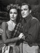 Brigadoon photo print of a lady in a long sleeve dress with a man in a long sleeve polo.
