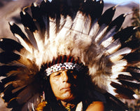 Iron Cody posed in Indian feather hat photo print