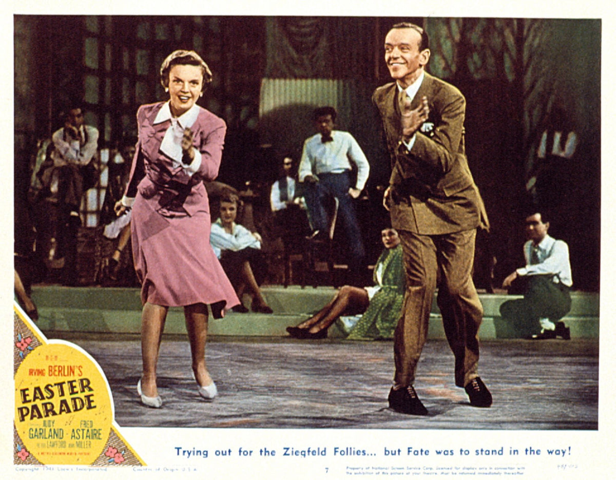 Easter Parade movie poster featuring Judy Garland and Fred Astaire.