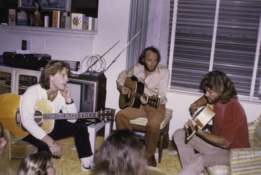 The Bee Gees and Andy Gibb photo print in multiple sizes.