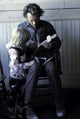 Clint Eastwood building a toy airplane with his son photo print.