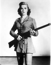 Phyllis Coates portrait carrying a rifle photo print.