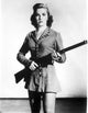 Phyllis Coates portrait carrying a rifle photo print.