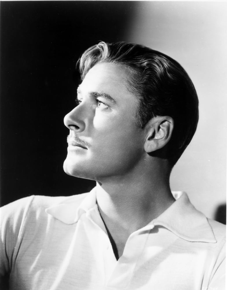Classic Errol Flynn photo print capturing the essence of Hollywood.