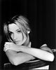 Black and white photo print of Lisa Marie sitting backwards on a chair.