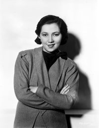 Patsy Kelly smiling photo print with hands crossed on chest