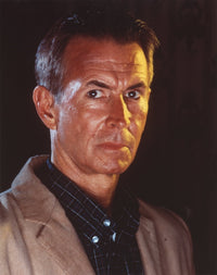 Serious portrait photo print of Anthony Perkins, available in multiple sizes.