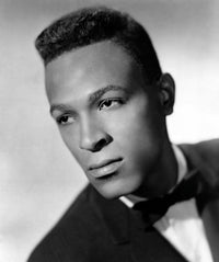Marvin Gaye in a stylish suit photo print, capturing the essence of soul music.