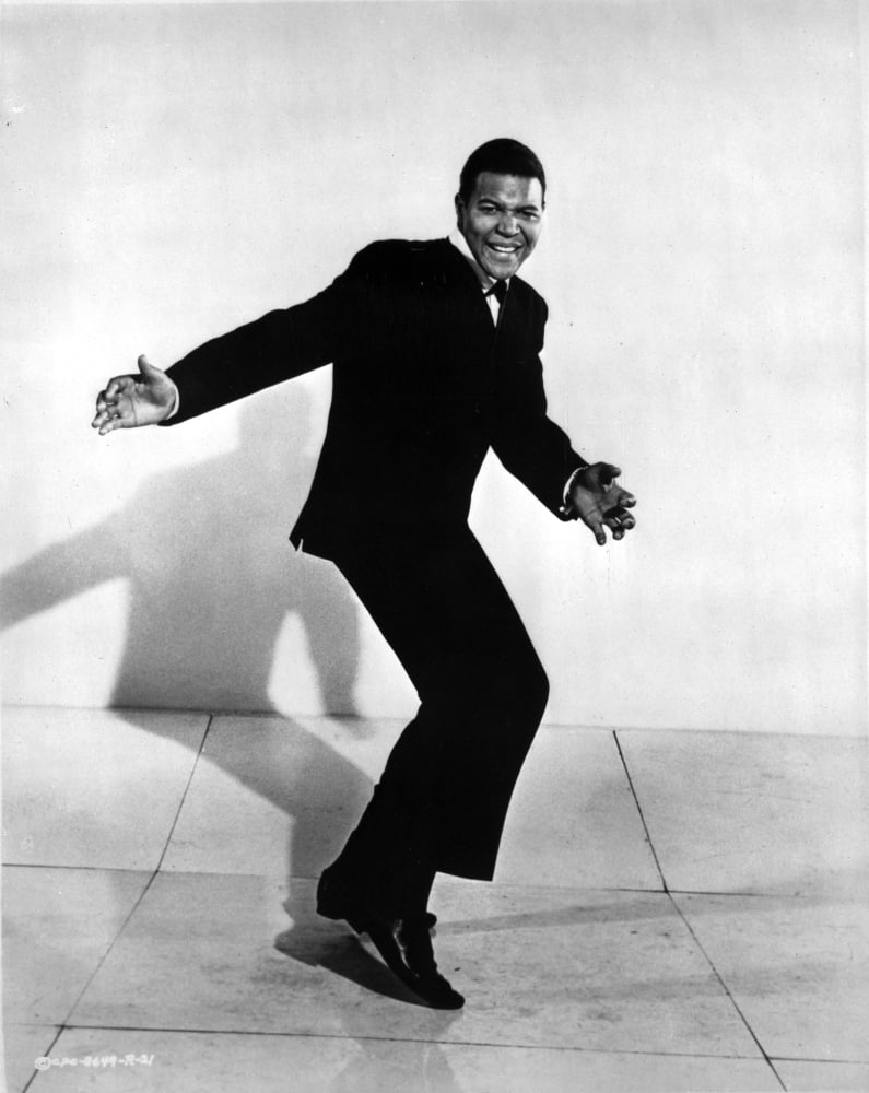 Chubby Checker dancing photo print showcasing vibrant energy